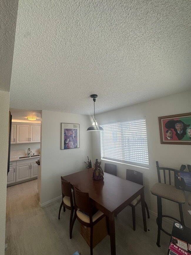 Building Photo - Gorgeous Condo in Seward Park with 2 Parking Spaces, Steps Away from Pool with Water View!