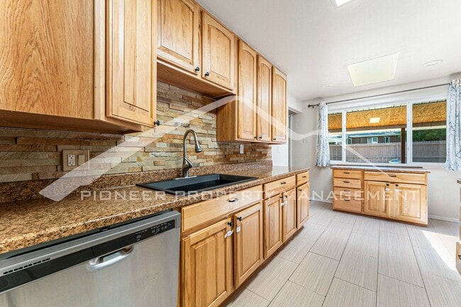 Building Photo - Spacious Home with Fenced Yard and Central AC