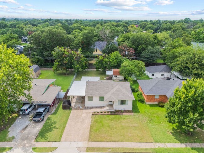 Building Photo - **$40K+ IN UPGRADES AND A FENCED BACKYARD WITH TWO STORAGE BUILDINGS**