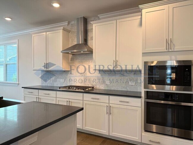 Building Photo - Spacious Corner-Lot Home with Guest Suite, Screened Porch & Detached 2-Car Garage – Resort-Style ...