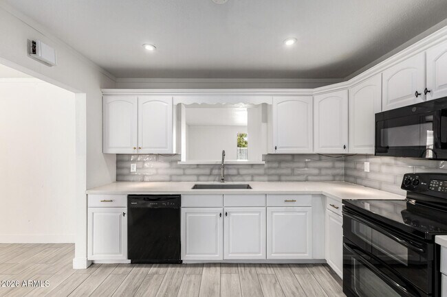 Building Photo - 3920 W Harmont Dr