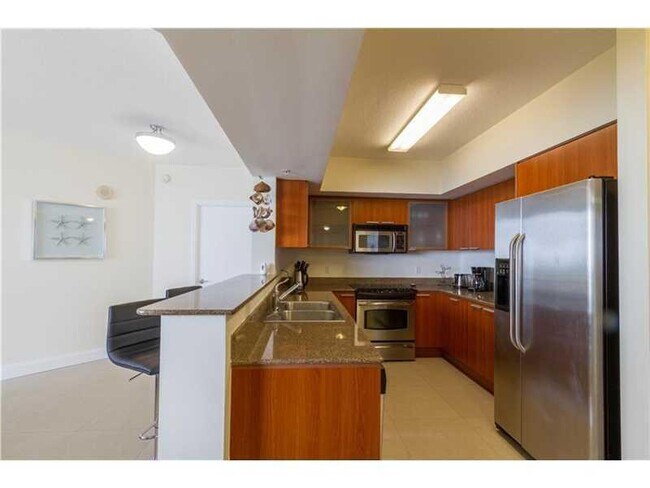 Building Photo - 16699 Collins Ave