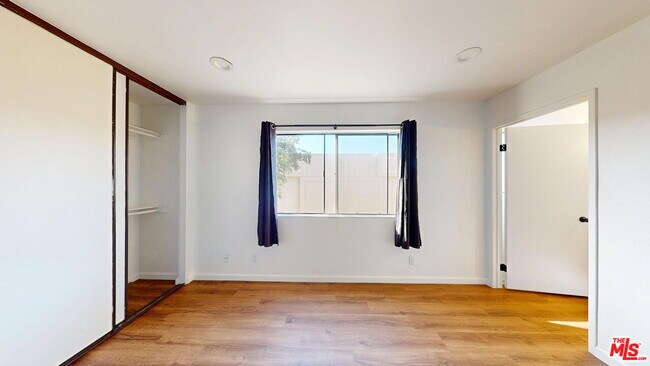 Building Photo - 10220 De Soto Ave