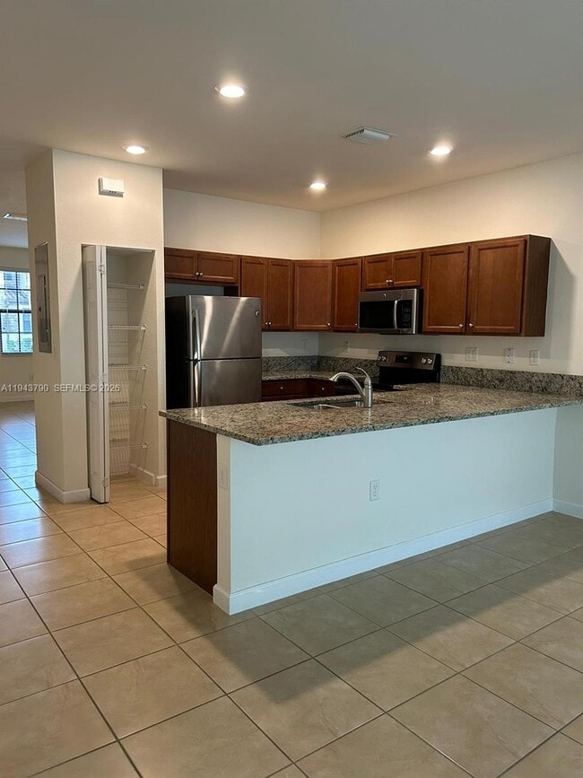 Building Photo - 9332 W 33rd Ln