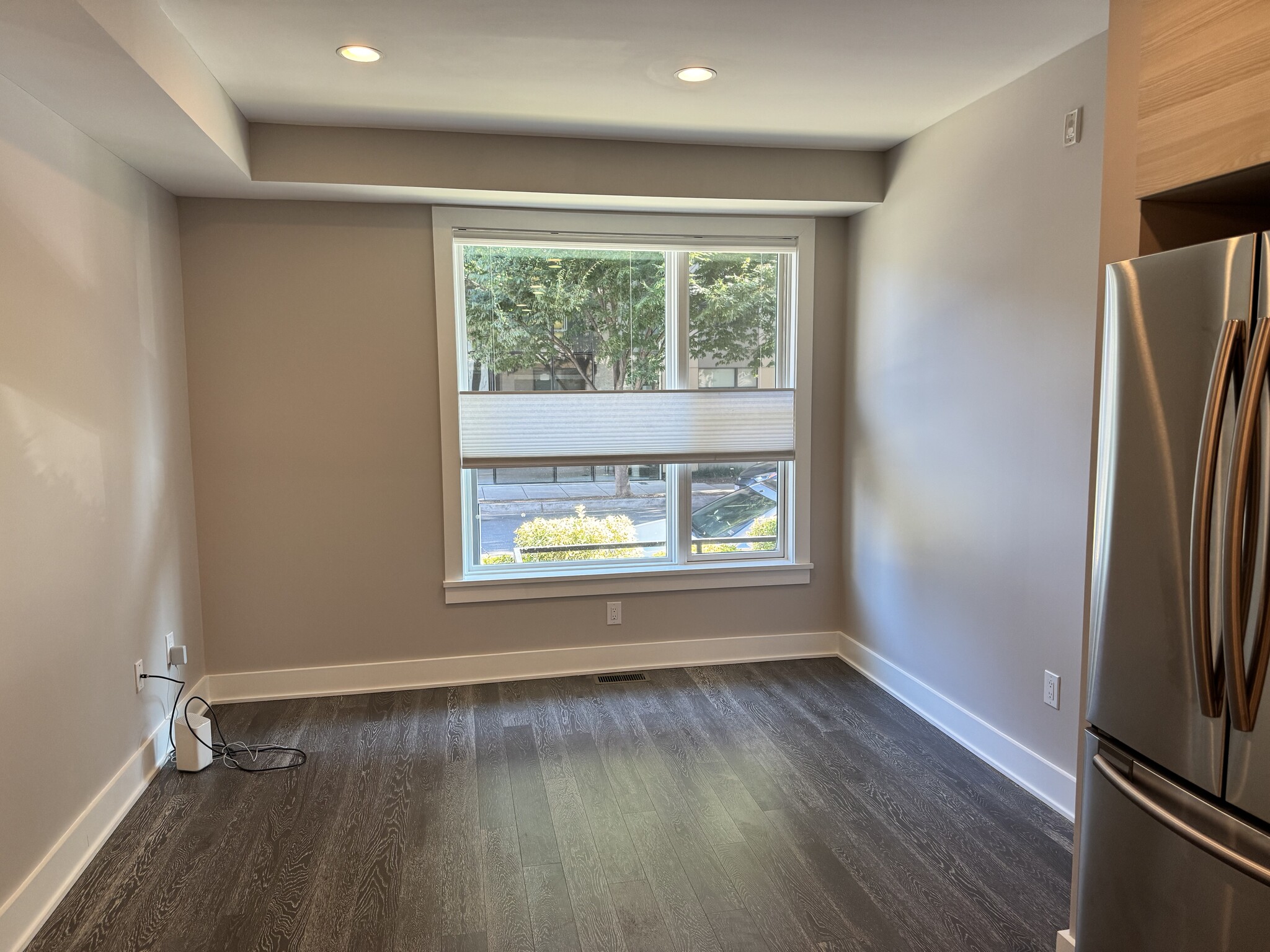 Living and dining room area (Right wall: 8'9", Window wall: 10'10", Left wall: 14'2") - 703 Newton Pl NW