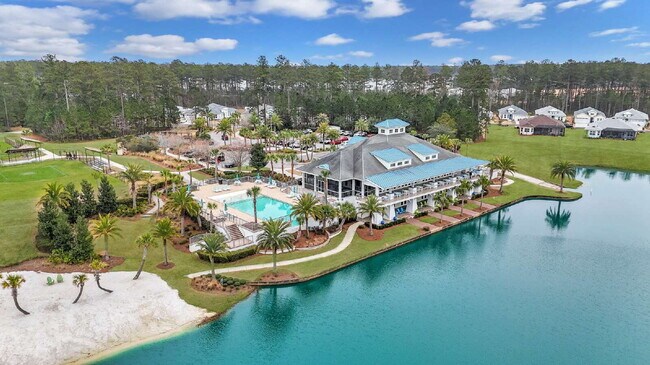 Building Photo - "Charming 2-Bedroom Retreat with 2 Baths and Den - 1558 Sq. Ft. of Comfort in Latitude Margaritav...