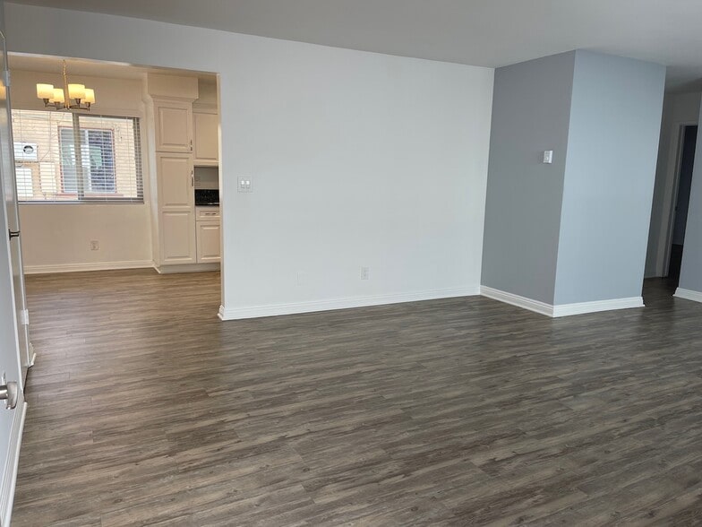Living room looking into Kitchen - 718 N Guadalupe Ave