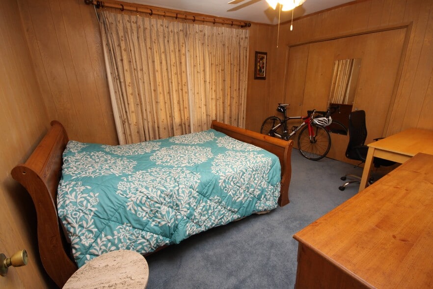 Paneled room, big bay window facing East - 11061 Missouri Ave