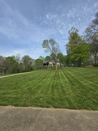 Building Photo - Luxury 4-Bedroom Home with Outdoor Oasis i...