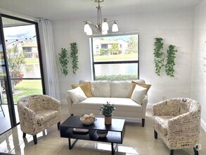 Building Photo - 8625 Boca Glades Blvd W
