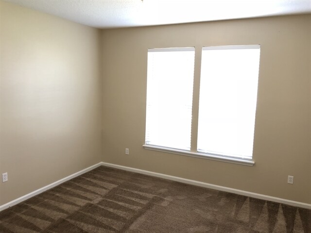 Building Photo - 7117 Rapid River Dr W