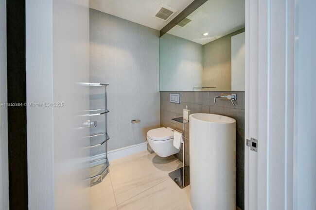 Building Photo - 10203 Collins Ave