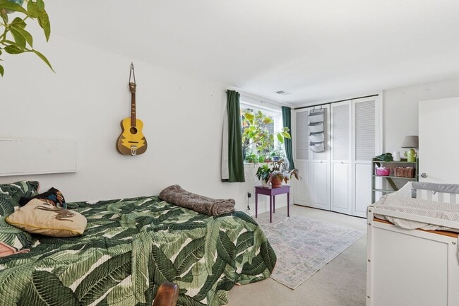 Building Photo - This beautifully refreshed condominium offers a refined blend of style and comfort