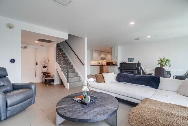 Building Photo - Penthouse Living in Charming Little Italy
