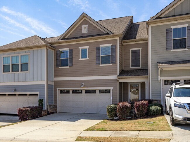 Building Photo - **MOVE IN SPECIAL! 50% off first month's rent!!** Spacious 4BR Townhouse with 2-Car Garage Near D...