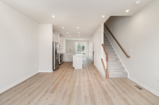 Building Photo - New Construction 3 Bedroom Townhome in Fre...