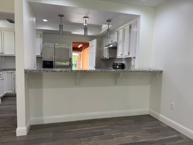 Building Photo - Gorgeous 2 bedroom 2 bath duplex in the trees