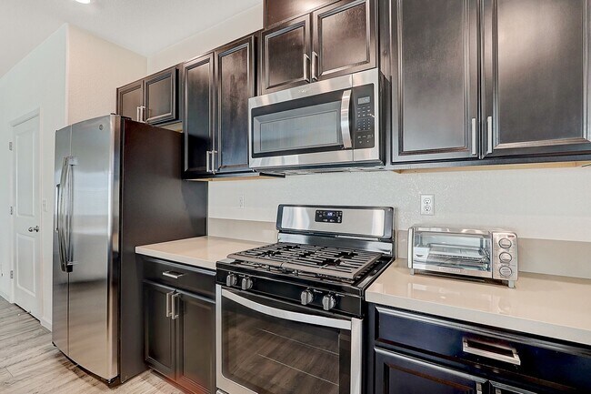 Building Photo - 4 YEARS NEW, FULLY FURNISHED 4 BEDROOM, 2....