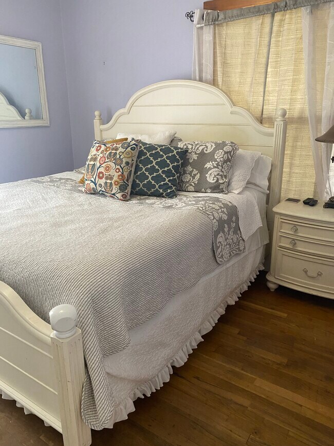One of four bedrooms. - 710 N Main St