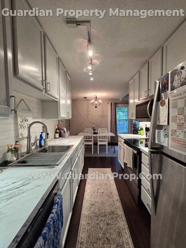 Building Photo - St Louis Park Condo by West End, Garage in...