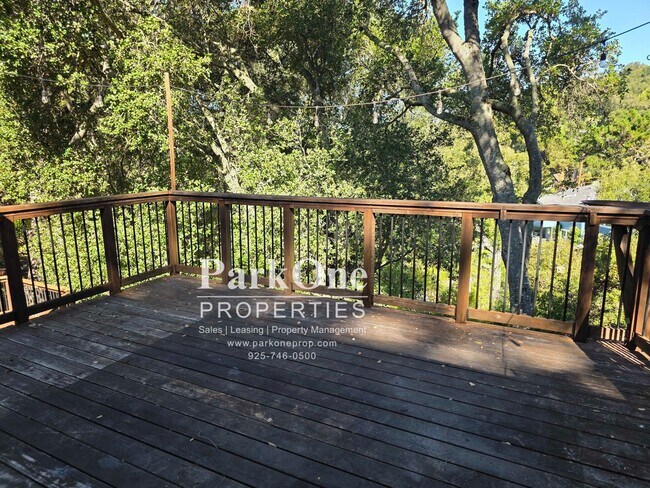 Building Photo - Spacious Home on a Private Wooded Lot Now Available!