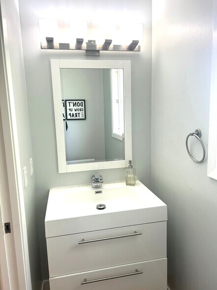 Half Bathroom off of the kitchen - 1415 Butterfield Rd