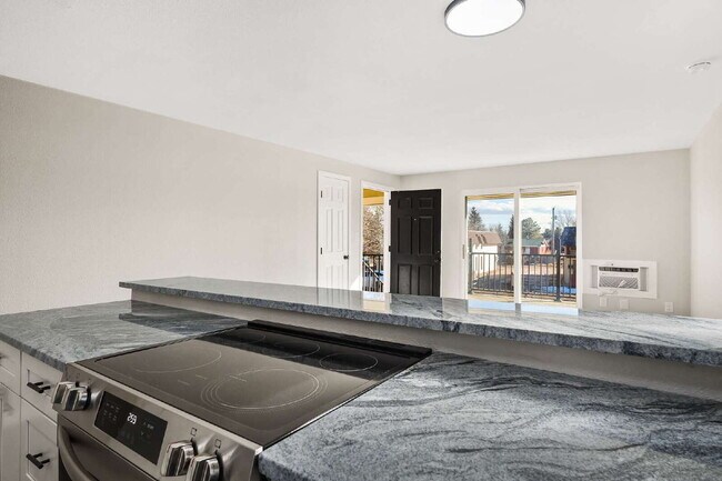 Building Photo - 2-Bedroom Gem with Granite Countertops Available in May