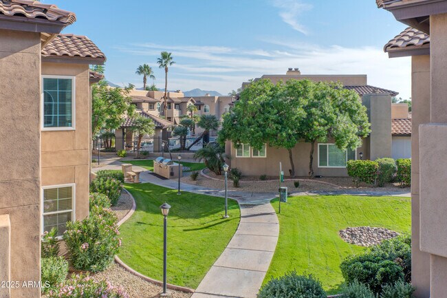 Building Photo - 9450 E Becker Ln