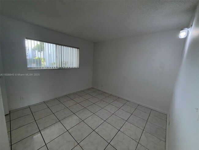 Building Photo - 8560 N Sherman Cir