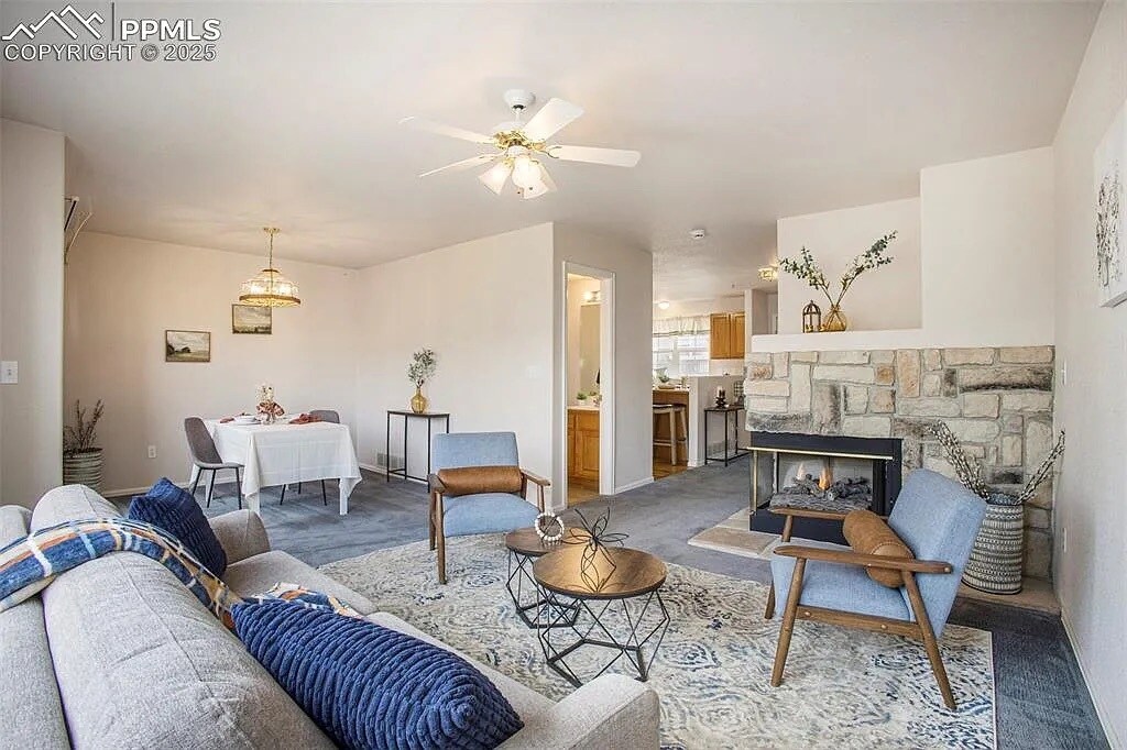 Living and Dining Rooms w/ gas fireplace - 3272 Capstan Way