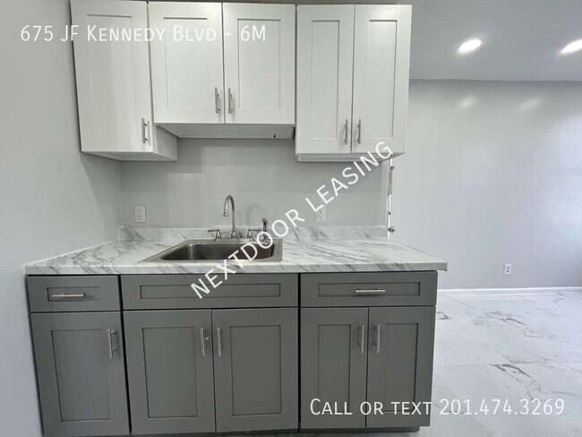 Building Photo - 675 John F. Kennedy Blvd