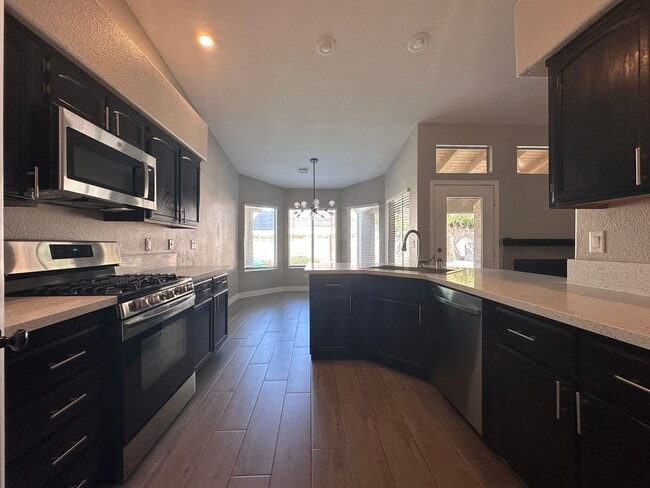 Building Photo - UPGRADED SINGLE STORY HOME WITH 4 BEDS, 2....