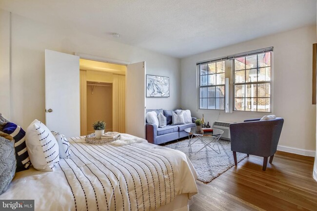 Shows staged version of furnished apartment - 3051 Idaho Ave NW