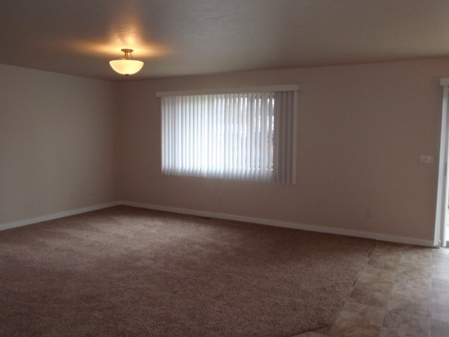 Building Photo - Newer house with attached garage. Half mon...