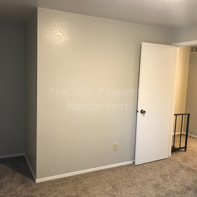 Building Photo - $1300...2Bed 1.5 Bath, Small Fenced in Covered Patio on Back, Storage