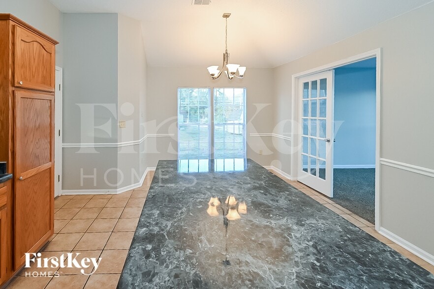 Building Photo - 7395 Kevin Rdg Cv E