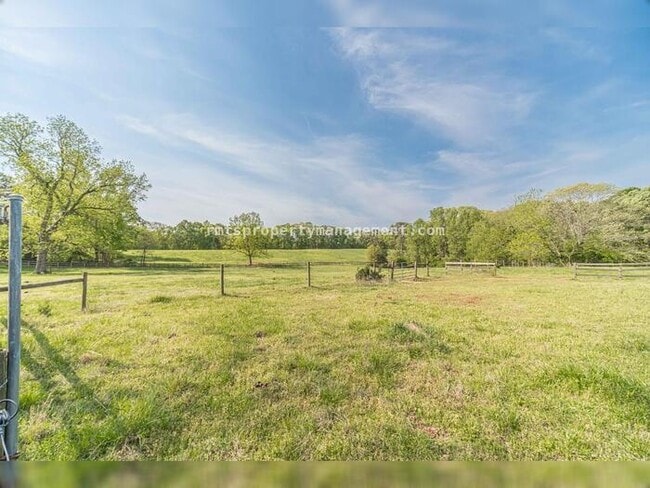 Building Photo - 7680 Jefferson River Rd