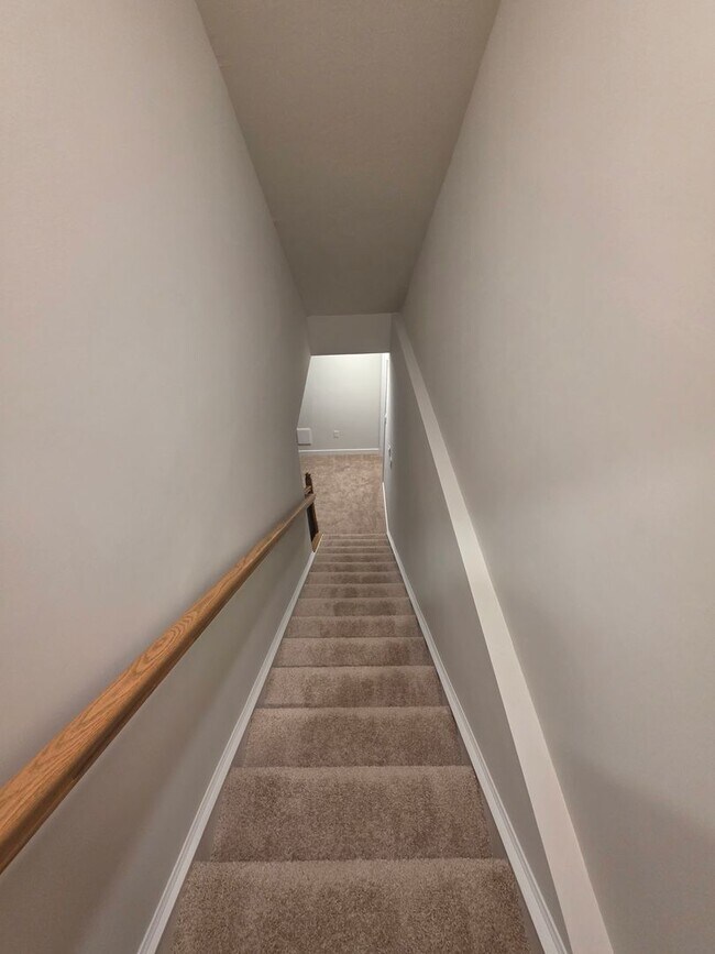 Building Photo - Luxury 4-Bedroom Townhome with Finished Walkout Basement & River Views