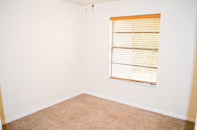 Building Photo - Check out this huge private fenced back yard at this Timberlane home!