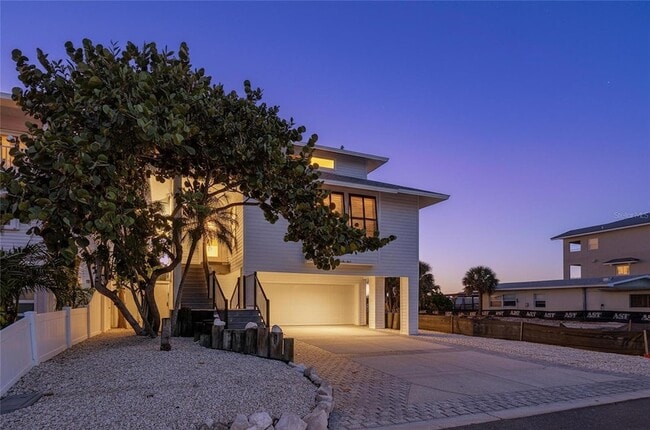 Building Photo - 8485 Blind Pass Dr