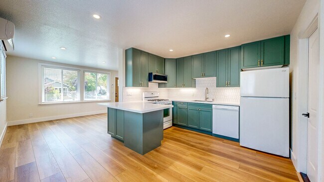 Building Photo - Bright Newly Refurbished Two Bedroom One Bath Single Family Home