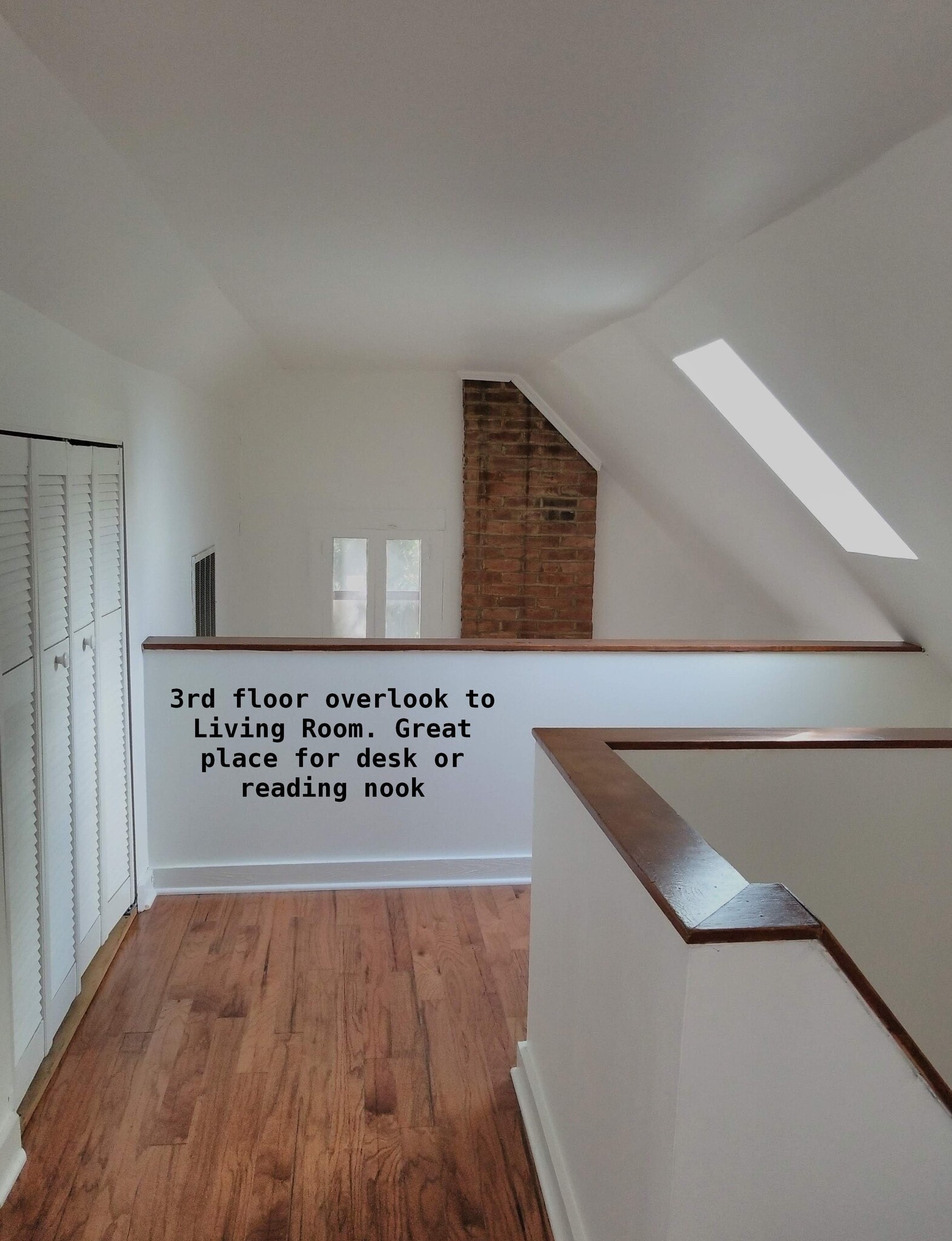 3rd floor overlook into living room - 810 E Washington St