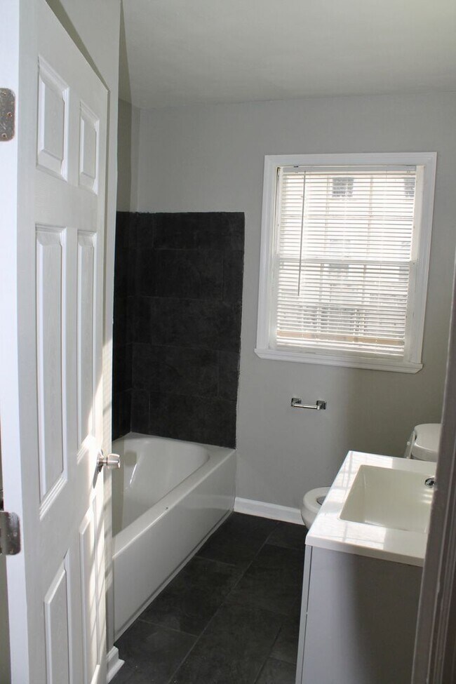 Building Photo - Luxurious Newly Renovated 3BR/2BA Haven with Private Parking - A Rare Market Gem