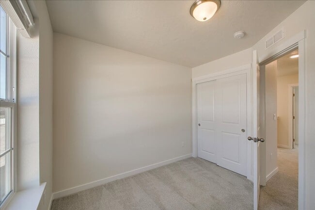 Building Photo - Two Story Townhome Located Off Of Amity & Five Mile!