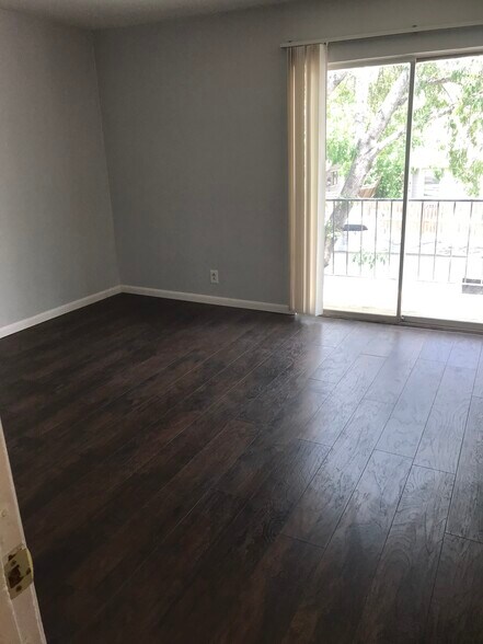Patio area off primary bedroom for enjoying the sun and view - 1338 Churing Dr