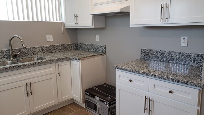 Building Photo - 2057 W Florence Ave