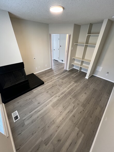 Bedroom 2 or Den space - with wood burning fireplace - 6650 E Arizona Ave