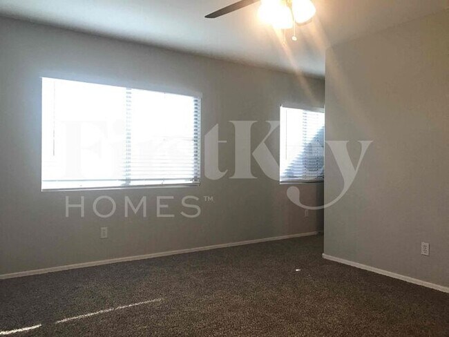 Building Photo - 8334 W Hughes Dr