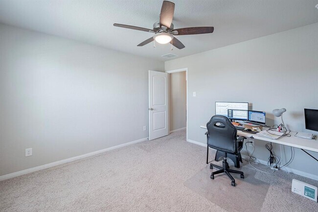 Building Photo - 4923 Blue Jacaranda Wy