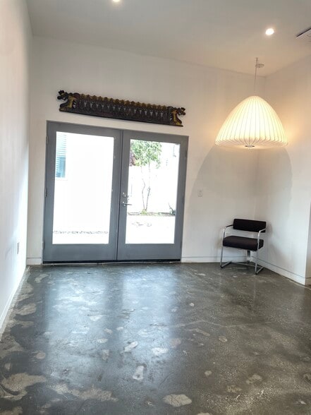 Living space with french doors to patio - 2725 Dalton Ave